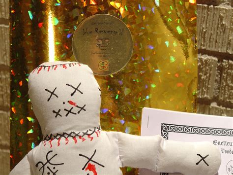 Dissecting the Elements of a Brick Red Voodoo Doll: Cloth, Pins, and More